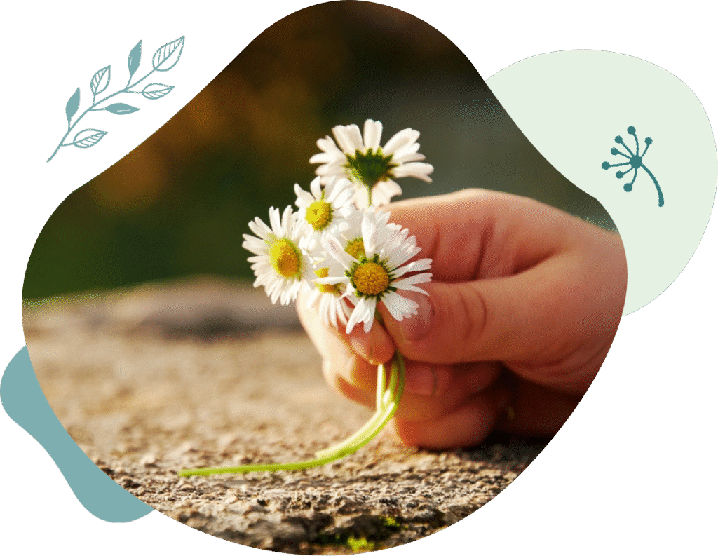 Hand picking flowers with plant graphics